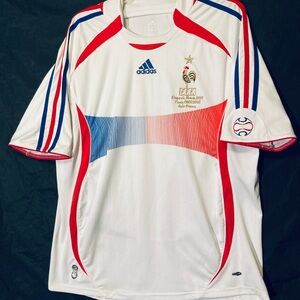Adidas White Soccer Jersey with Red and Blue Accents